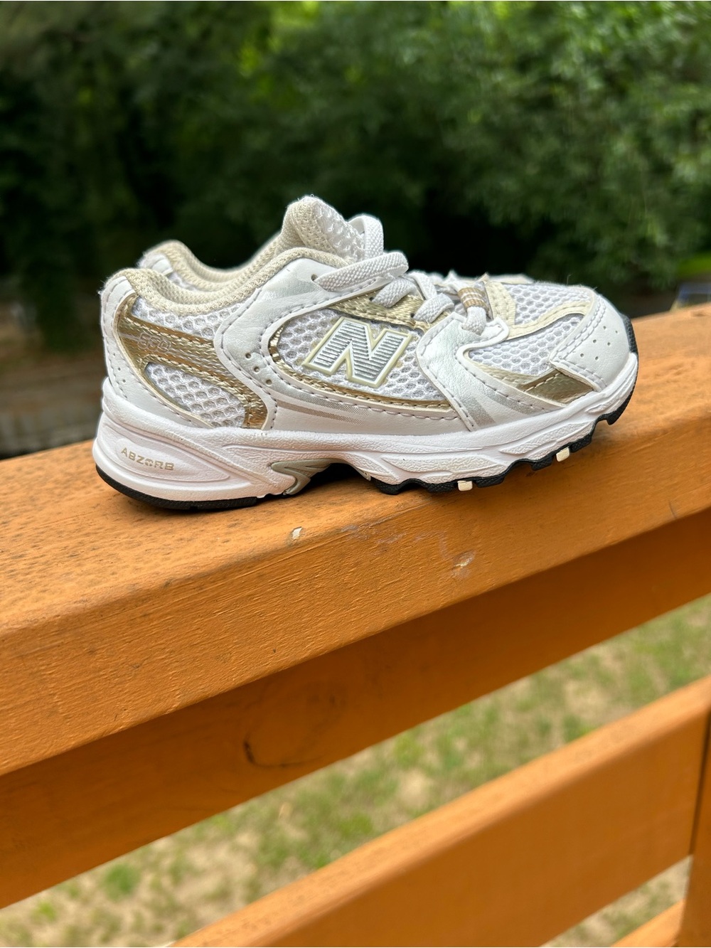 New Balance Kids White & Gold Athletic Sneakers